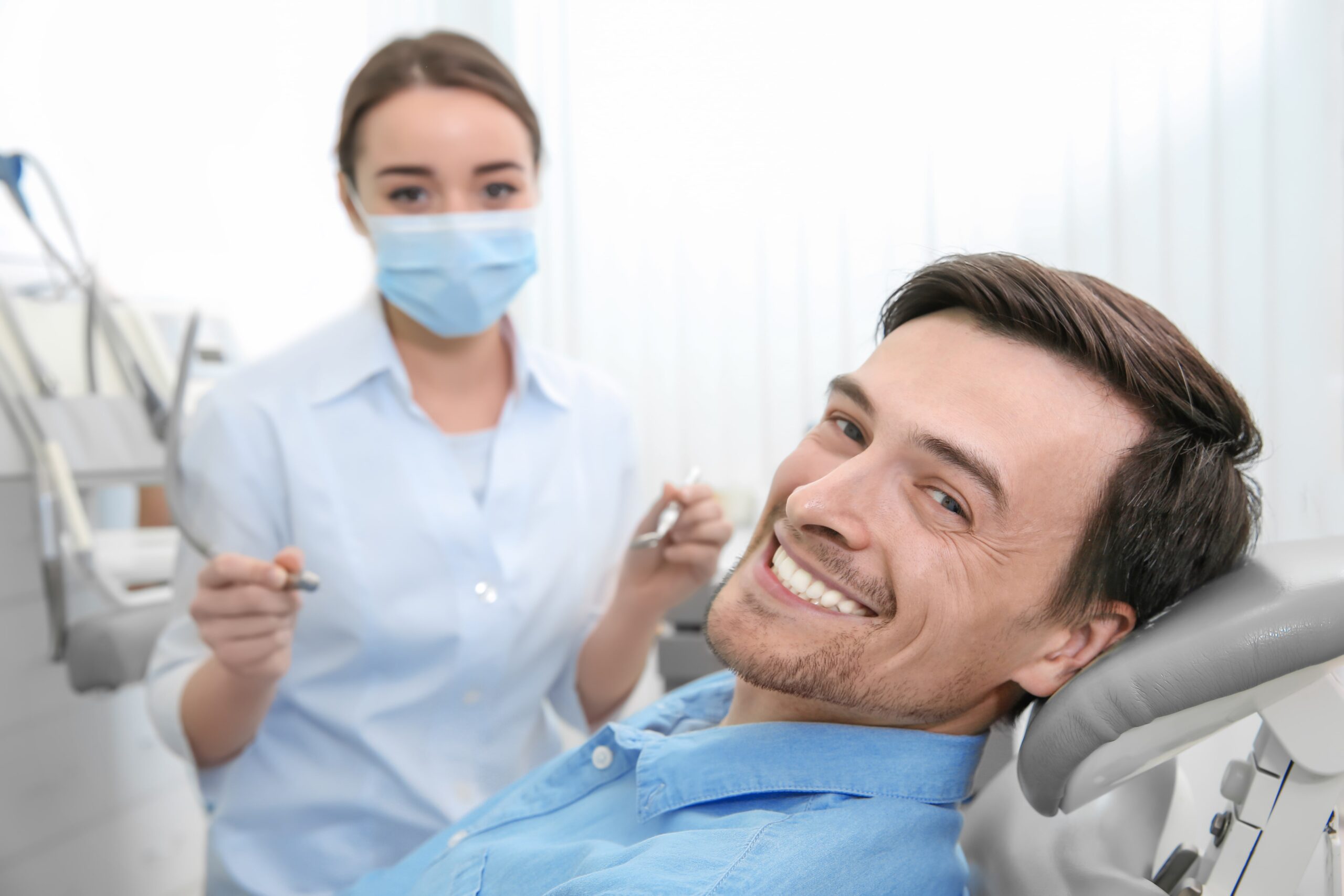 Man-smiling-in-dental-chair